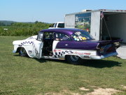 Purple and White 1955 Chevrolet Drag Car with checkered paint